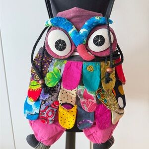 Colorful animal bag with shoulder strap and drawstring opening